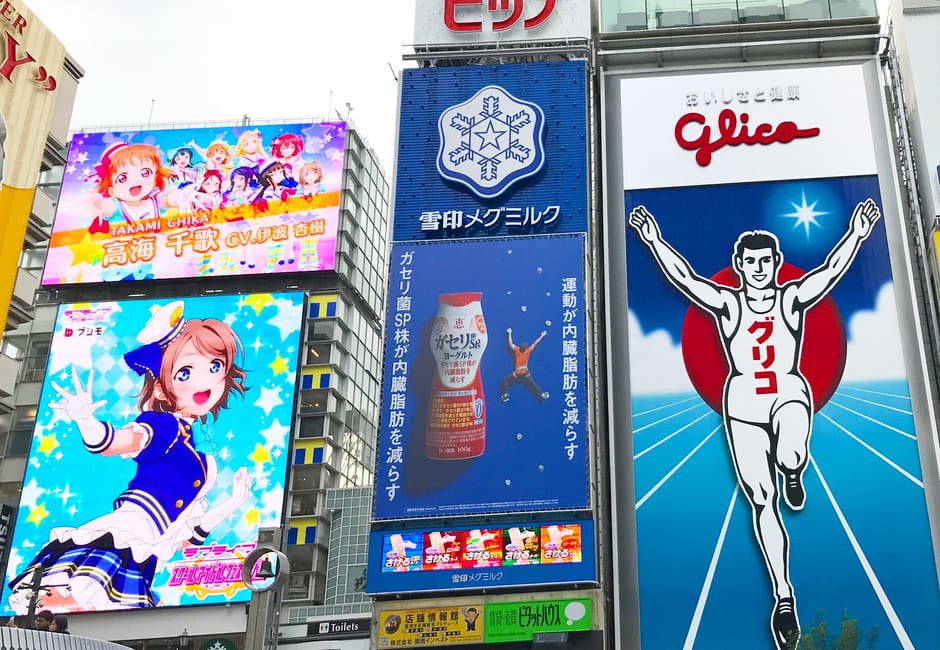 Glico running man billboard above Dotonbori in Osaka